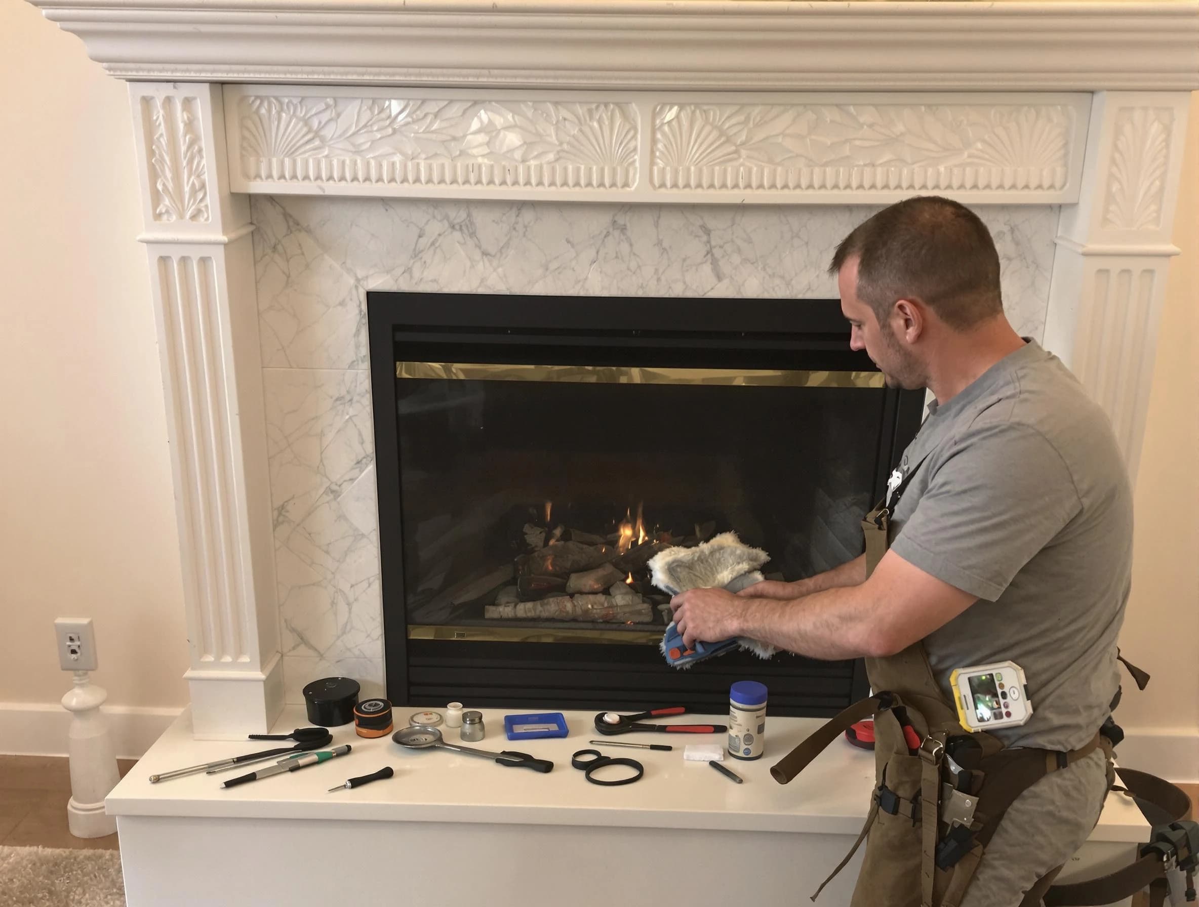 Murray Chimney Sweep performing fireplace maintenance in Murray, UT
